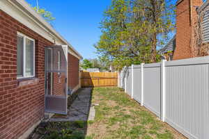 View of fenced backyard