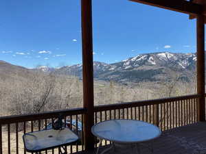 Deck featuring a mountain view