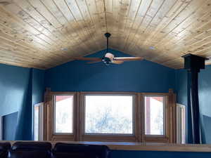 Detailed view of a ceiling fan and wooden ceiling