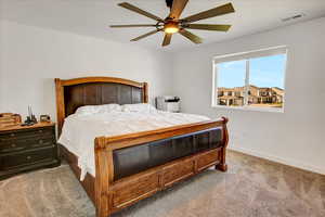 Carpeted bedroom with baseboards and ceiling fan