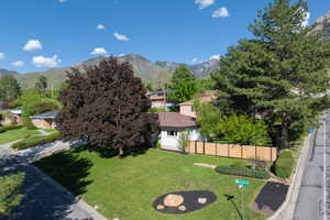 View of side of property featuring a mountain view