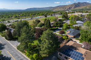 View of property location with a mountainous background and nearby suburban area