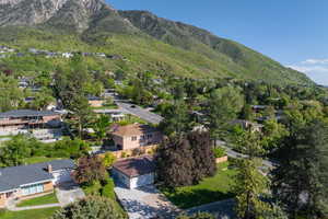 Aerial view of residential area with a mountainous background