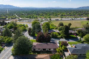 Aerial view of residential area featuring mountains