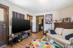 Living area featuring wood finished floors