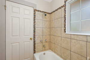 Bathroom with shower / tub combination