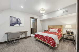 Bedroom featuring carpet flooring, recessed lighting, and baseboards