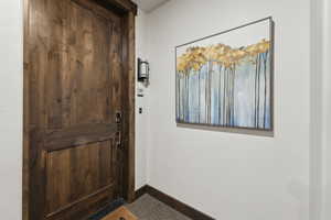 Entryway featuring baseboards