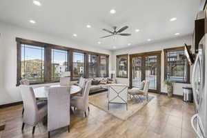 Dining space with recessed lighting, a ceiling fan, and baseboards