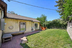 View of yard featuring ac unit and a patio