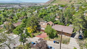 Aerial view of residential area featuring a mountain backdrop