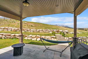 View of patio with a mountain view