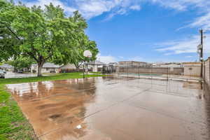 View of basketball court with community basketball court and a residential view