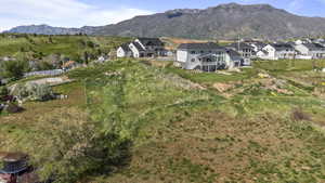 Aerial perspective of suburban area featuring mountains