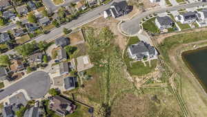 View of property location with nearby suburban area and a nearby body of water