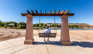 View of patio / terrace featuring a water view