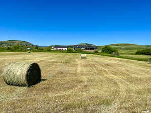 View of community with a mountain view and a view of countryside