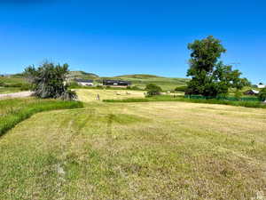 View of grassy yard featuring a view of countryside