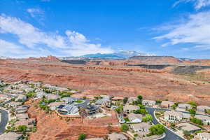 View of property location featuring nearby suburban area and a mountain backdrop