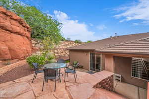 View of patio featuring outdoor dining area