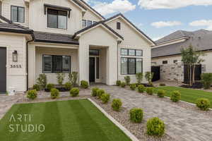 View of front of house with board and batten siding