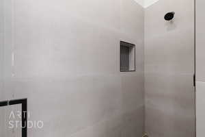 Bathroom view of tiled shower