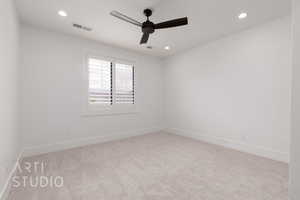 Empty room with carpet floors, ceiling fan, baseboards, and recessed lighting