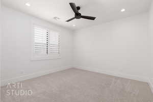 Empty room with a ceiling fan, carpet floors, recessed lighting, and baseboards