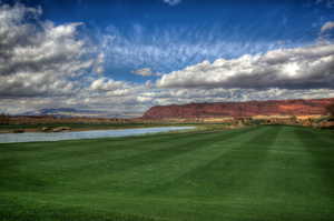View of home's community with a water and mountain view and view of golf course