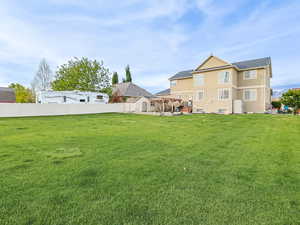 View of yard with a storage shed and an outbuilding