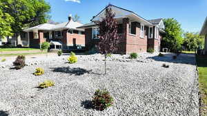 View of front of home with brick siding