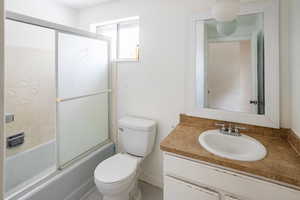 Upstairs Full bath with vanity, and enclosed tub / shower combo
