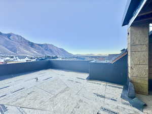 View of patio / terrace featuring a mountain view
