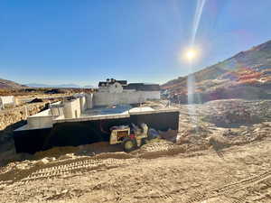 View of side of home featuring a mountain view