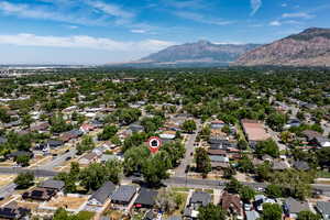 Aerial view of residential area featuring a mountain backdrop