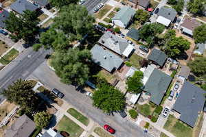 Aerial view of property's location with nearby suburban area