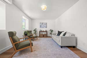 Living room featuring baseboards and wood finished floors