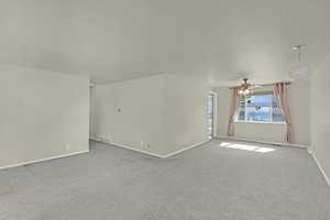 Spacious licing area with lots of light and adjacent dining area