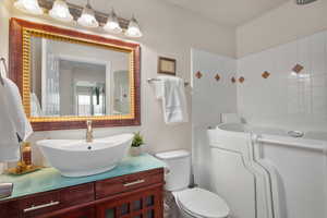 Bathroom with vanity and toilet