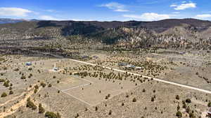 View of mountain backdrop featuring a desert landscape and rural landscape