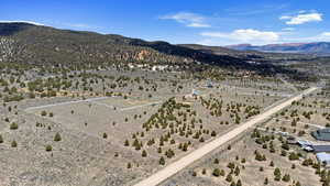View of rural area featuring a desert landscape and mountains