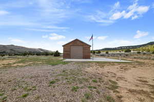 View of outdoor structure with an outdoor structure and a mountain view