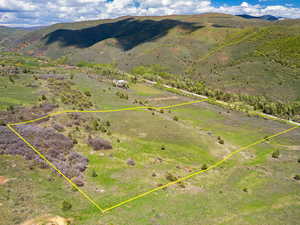 Aerial view of property with approximate property parcel outlined