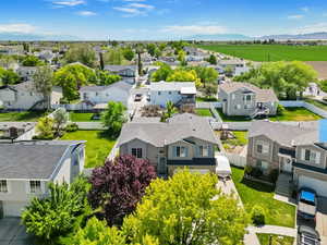 Aerial view of residential area with a mountain backdrop