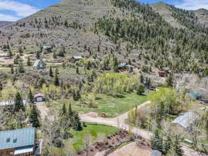 Aerial view of property's location with mountains