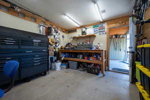 Garage featuring a workshop area