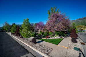 View of property exterior with a mountain view