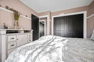 Bedroom featuring a closet