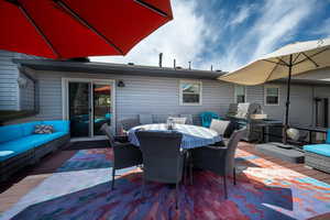 View of patio with a grill, an outdoor living space, and outdoor dining space