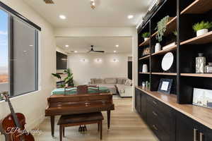 Interior space featuring light wood-style floors and recessed lighting